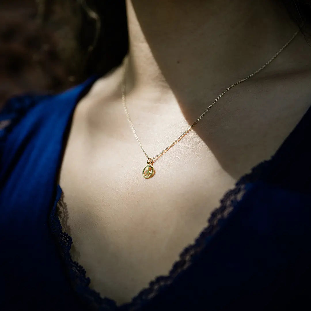 Tiny Peace Gold Necklace